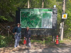 In many ways it was a resounding hike. Thirteen hours from the car park and back. Jirisan is a steep course. The ascent to Cheonwangbong (1915m) is 1300m in only 5km. It was a good reminder for my two American guests. I always find it hard to determine the exact time it will take to do the loop course. 8-12hrs. 
It was a pearler of a day. The weather was stunning. Spring greens and heaven blue sky. A cool zephyr. At the summit area it was much windier and cooler. A hoar frost and sleet 상고대 stuck to the trees and inside rocks. 
The only thing open by the time we get back to the dark and still carpark was the GS25. It had an excellent hall out the back with tables and chairs, and a couple of posse&rsquo;s of misfit late night hikers. Hot water area for cooking noodles which is what we did with a beer. Fantastic achievement for them two. Strong memories of Korea from this. They never shirked for a moment. Chur.